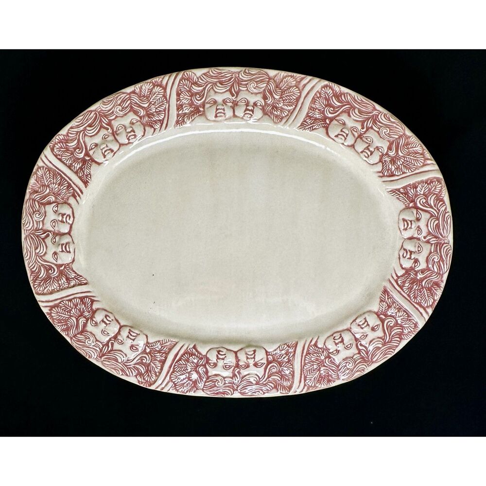 Handmade Cherub-Relief Pottery Platter